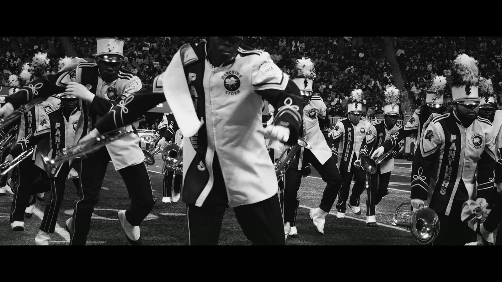The band marching downfield · photograph by Jeff Smith