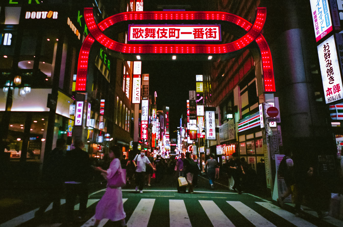 Kabukicho gate at night, Shinjuku · photograph by Jeff Smith